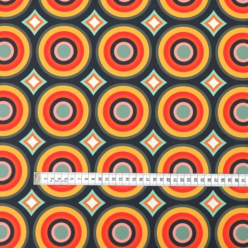 TKANINA WODOODPORNA Kółka retro pomarańczowe na grafitowym