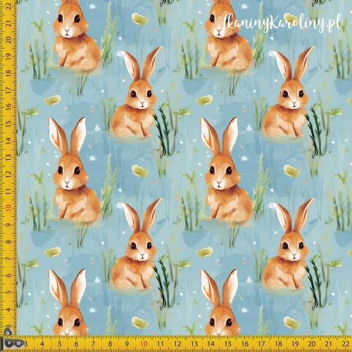 TKANINA WODOODPORNA OXFORD Zajączki 5 - brązowe w trawie na niebieskim tle